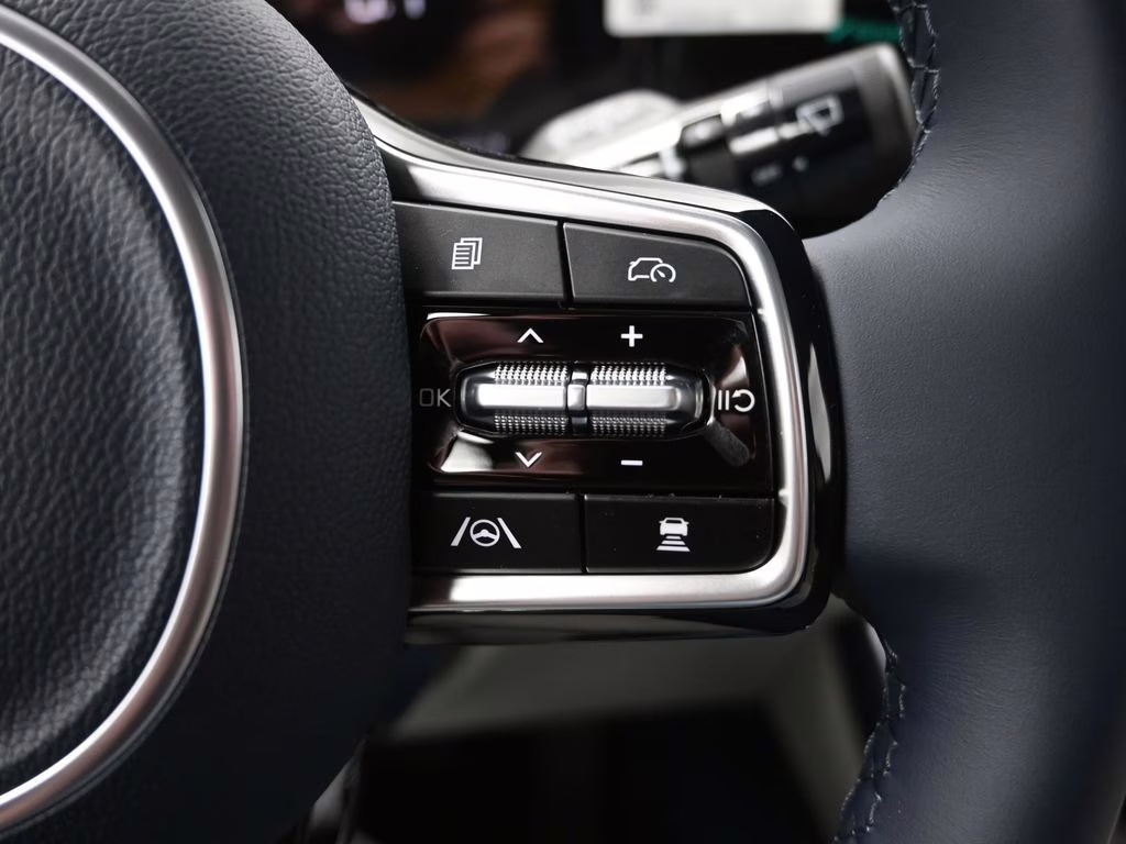 2026 Ceramic Silver Kia Carnival EX FWD Van