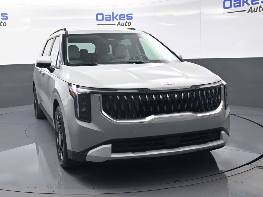 2026 Ceramic Silver Kia Carnival EX FWD Van