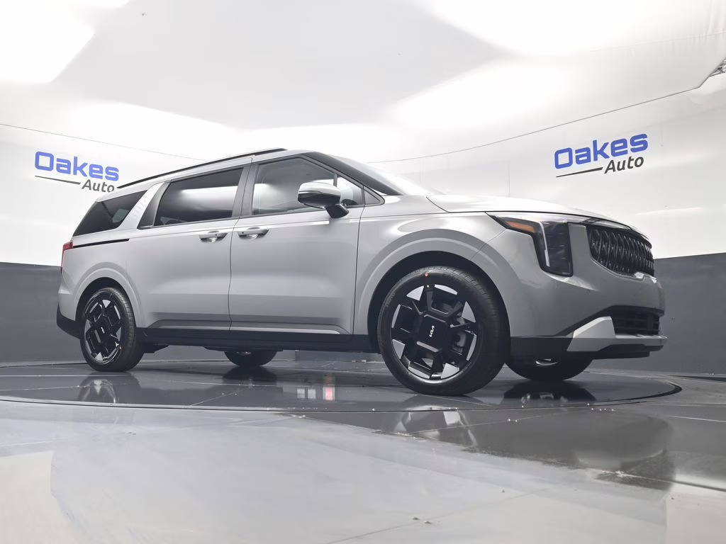 2026 Ceramic Silver Kia Carnival EX FWD Van
