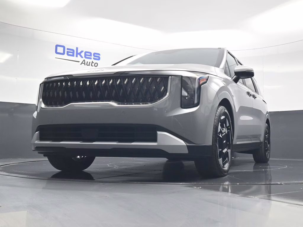 2026 Ceramic Silver Kia Carnival EX FWD Van