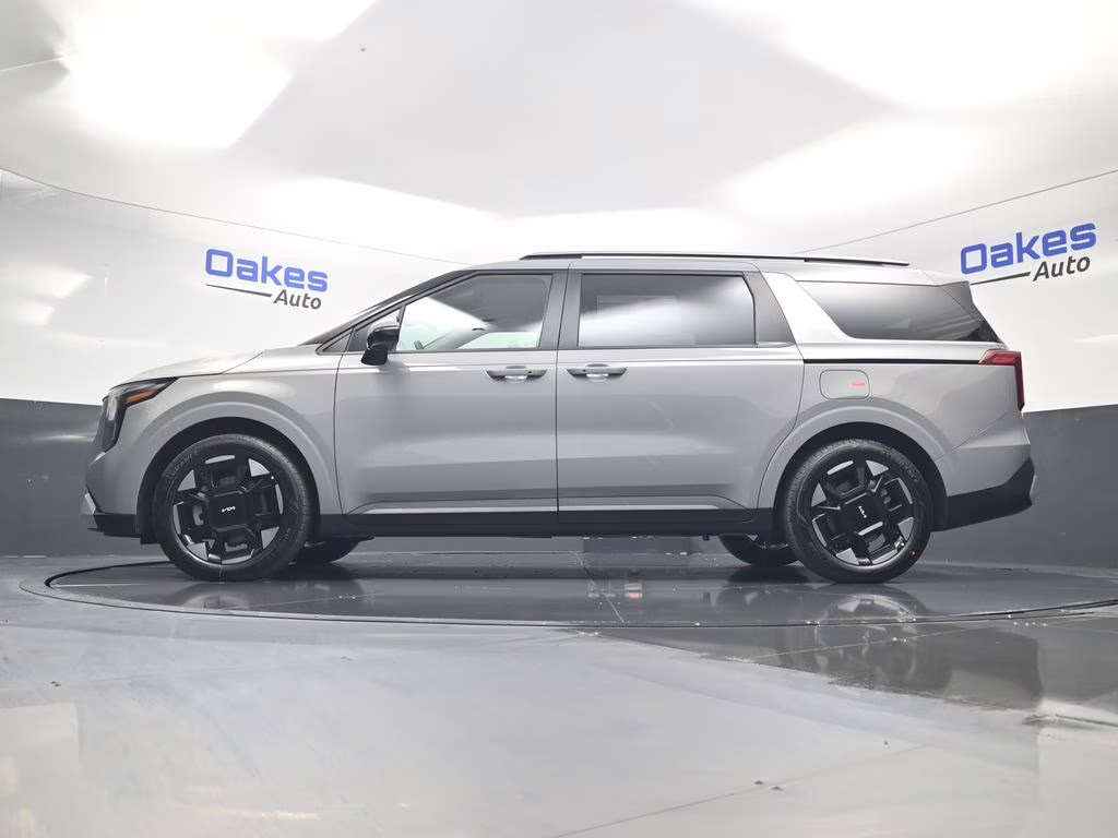 2026 Ceramic Silver Kia Carnival EX FWD Van