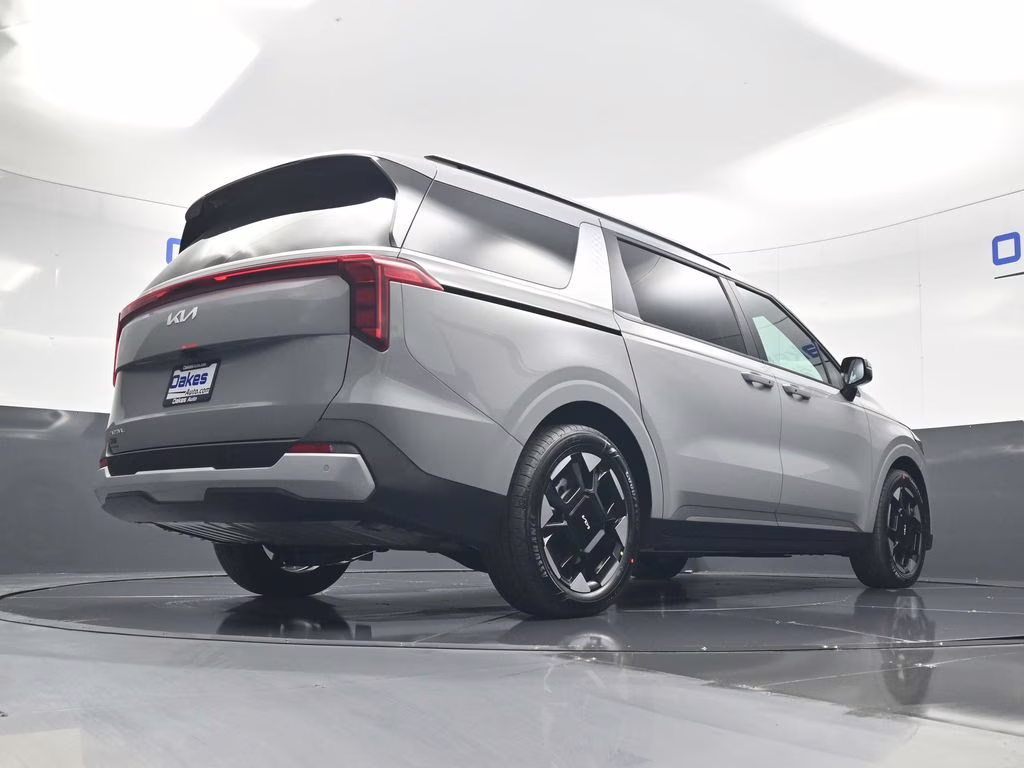 2026 Ceramic Silver Kia Carnival EX FWD Van
