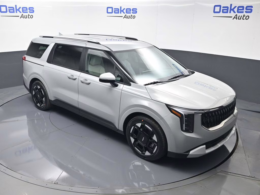 2026 Ceramic Silver Kia Carnival EX FWD Van