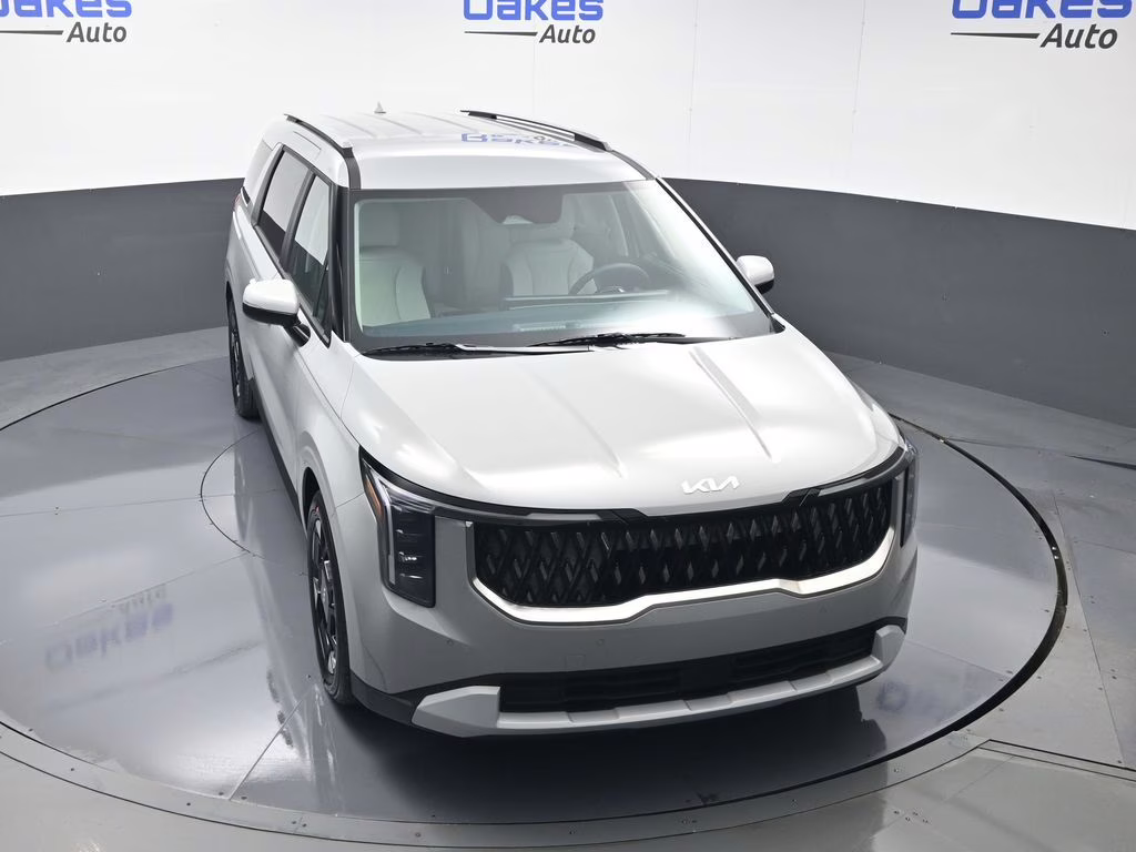 2026 Ceramic Silver Kia Carnival EX FWD Van