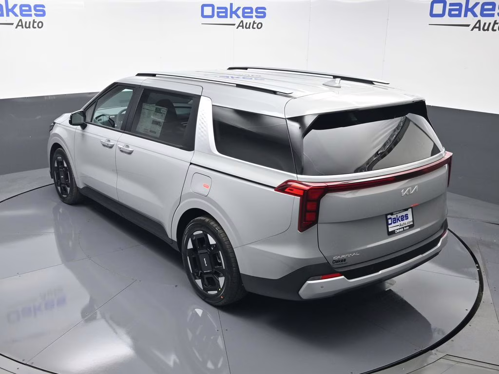 2026 Ceramic Silver Kia Carnival EX FWD Van
