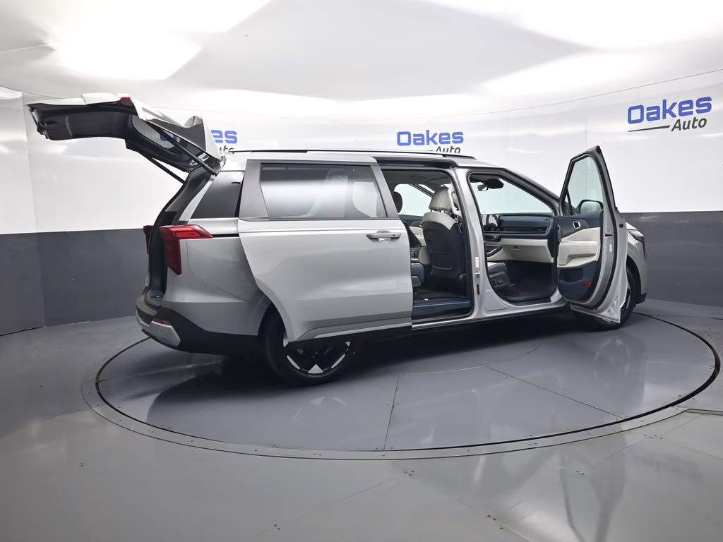 2026 Ceramic Silver Kia Carnival EX FWD Van