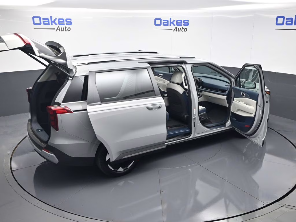 2026 Ceramic Silver Kia Carnival EX FWD Van