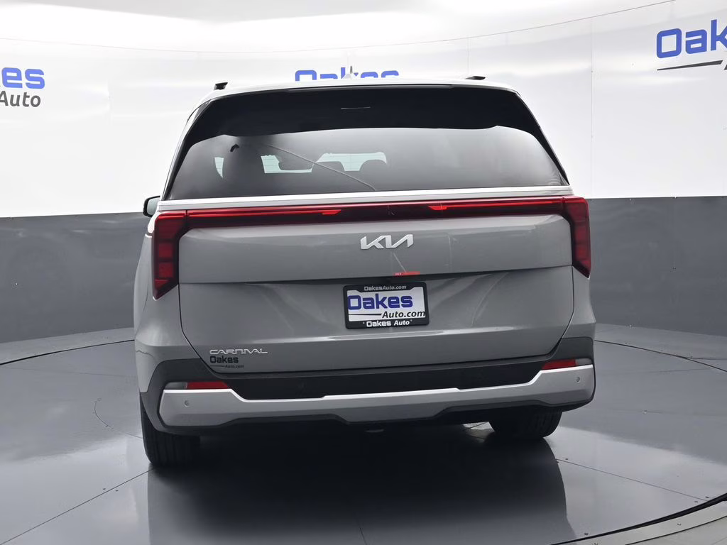2026 Ceramic Silver Kia Carnival EX FWD Van