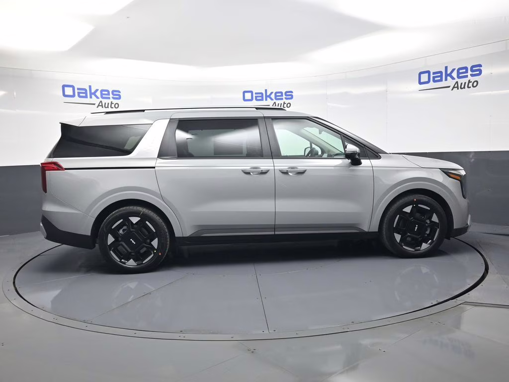 2026 Ceramic Silver Kia Carnival EX FWD Van