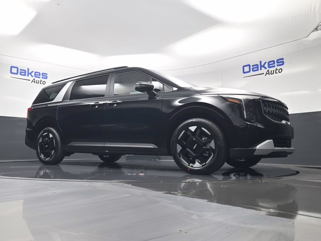 2026 Aurora Black Pearl Kia Carnival EX FWD Van