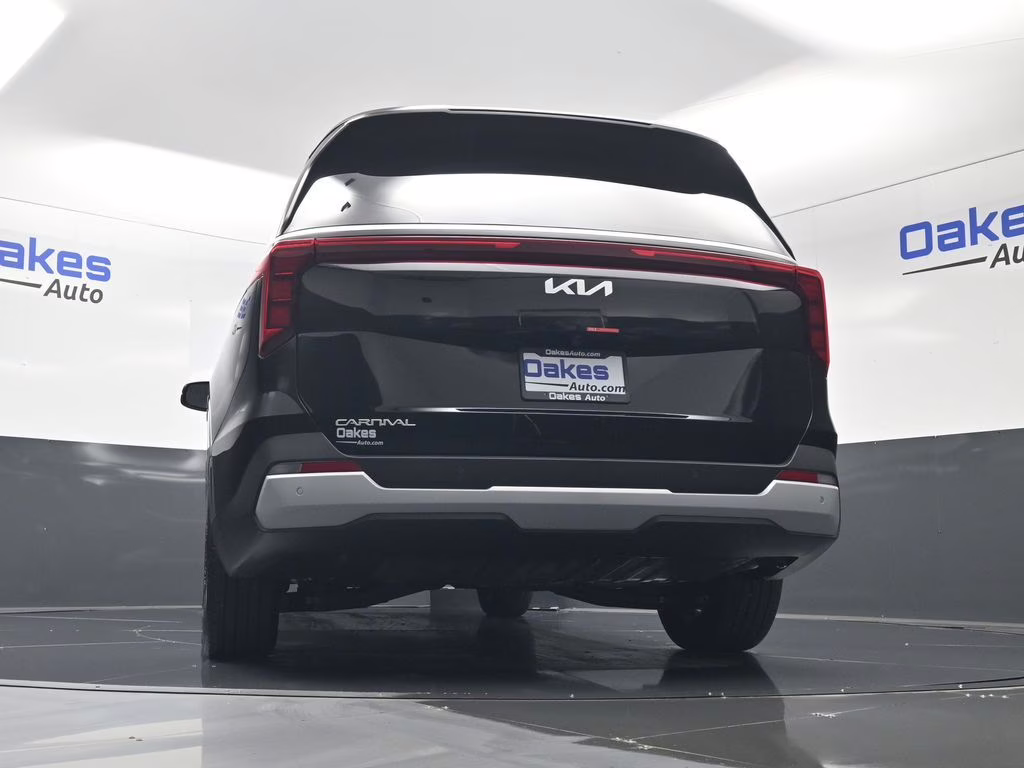 2026 Aurora Black Pearl Kia Carnival EX FWD Van