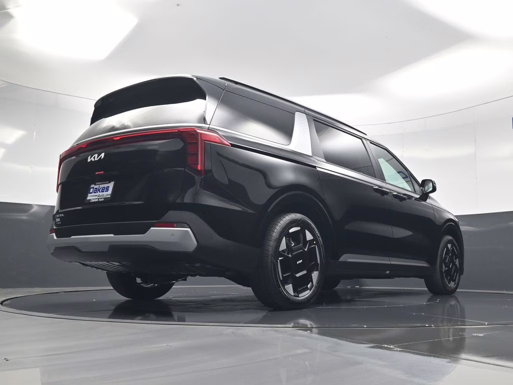 2026 Aurora Black Pearl Kia Carnival EX FWD Van