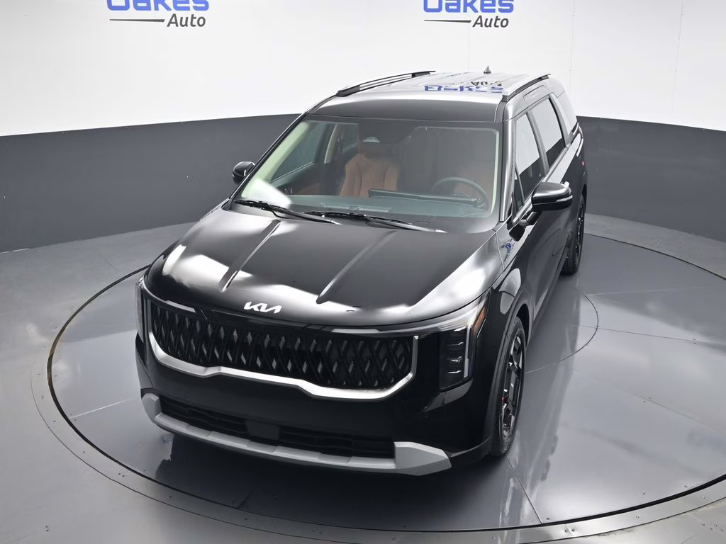 2026 Aurora Black Pearl Kia Carnival EX FWD Van