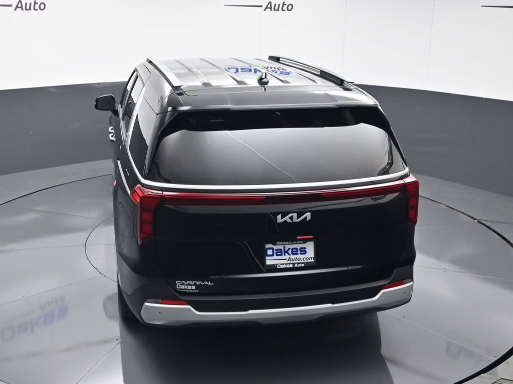 2026 Aurora Black Pearl Kia Carnival EX FWD Van