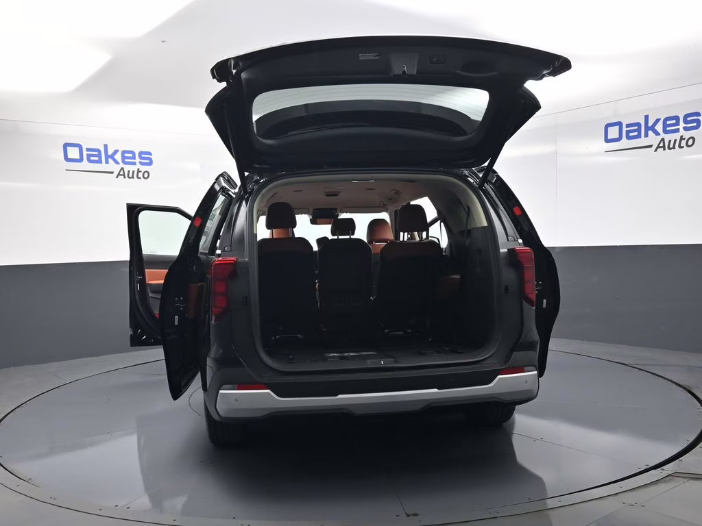 2026 Aurora Black Pearl Kia Carnival EX FWD Van