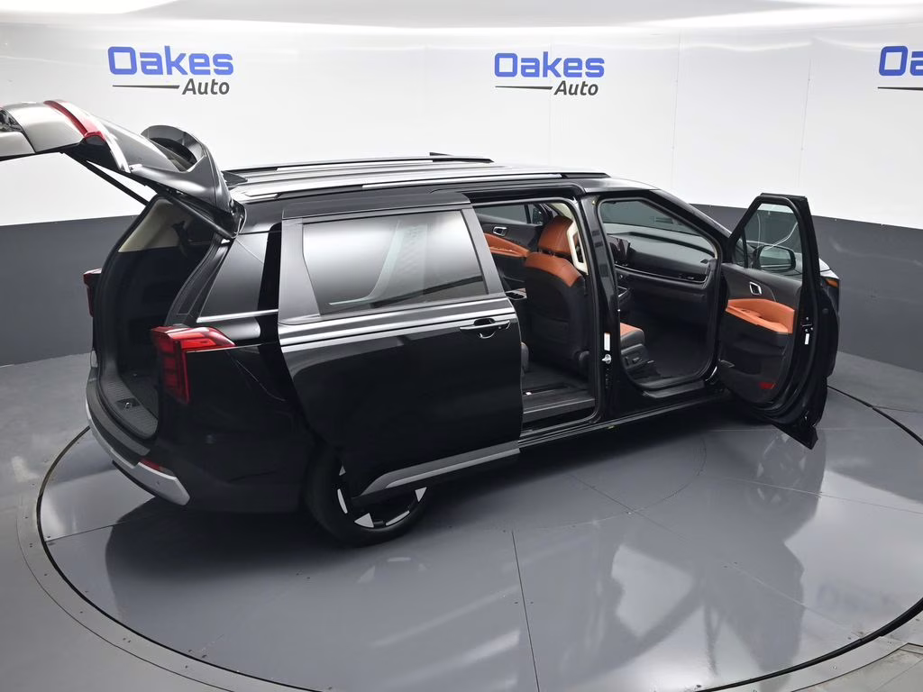 2026 Aurora Black Pearl Kia Carnival EX FWD Van