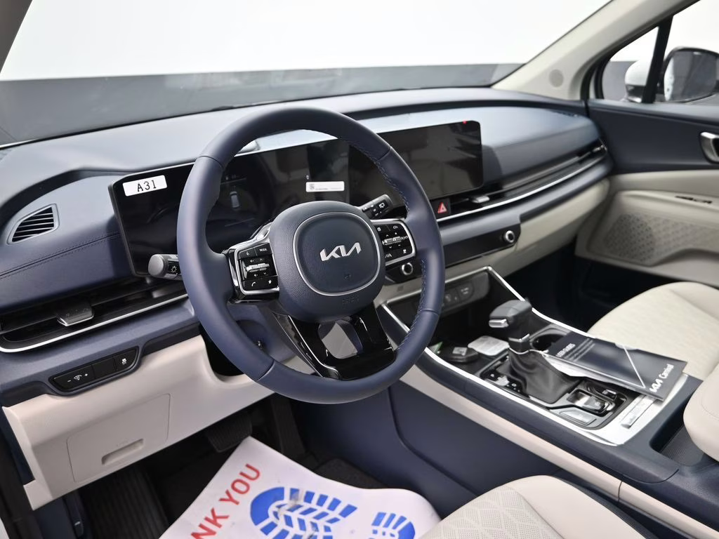 2026 Snow White Pearl Kia Carnival EX FWD Van