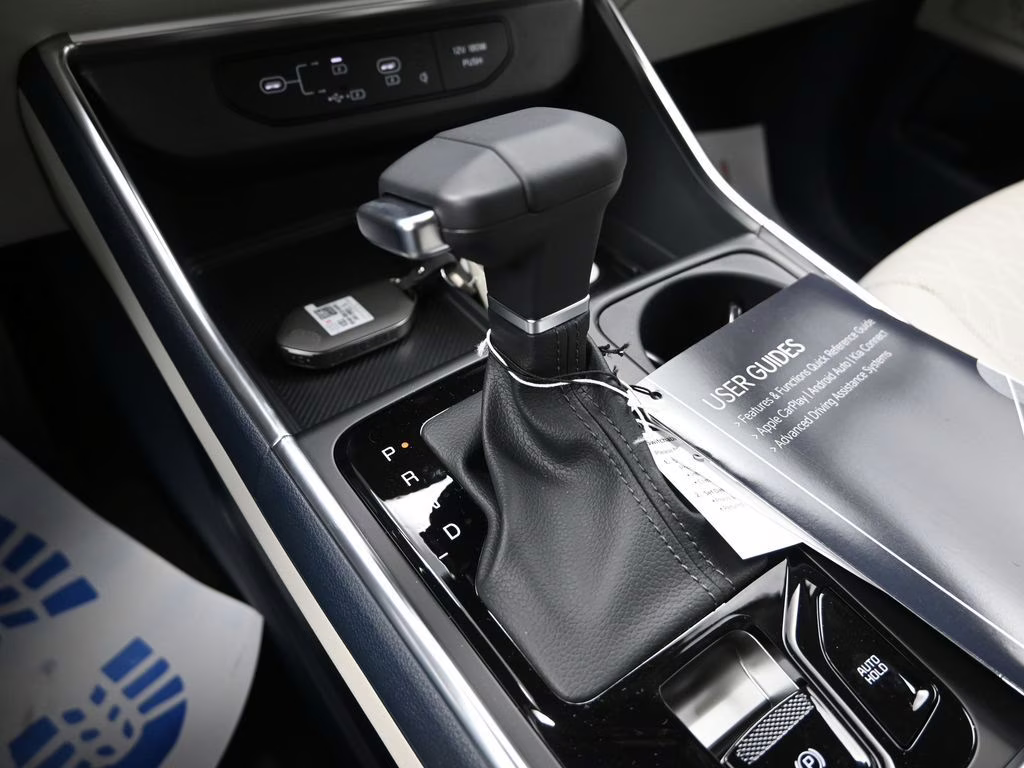 2026 Snow White Pearl Kia Carnival EX FWD Van