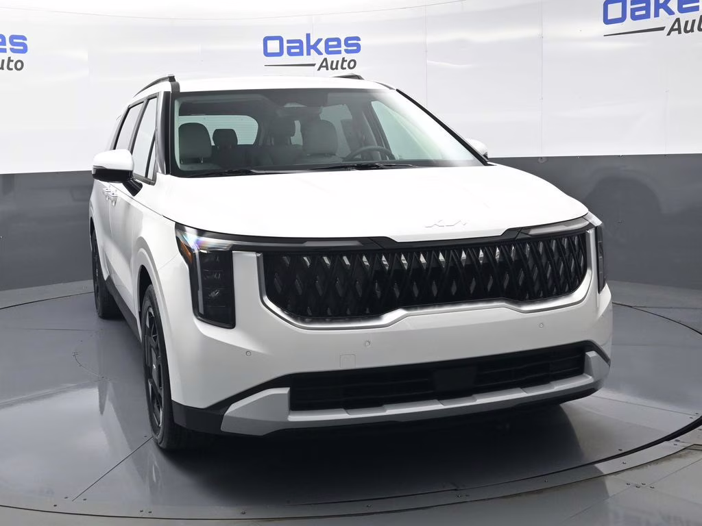 2026 Snow White Pearl Kia Carnival EX FWD Van