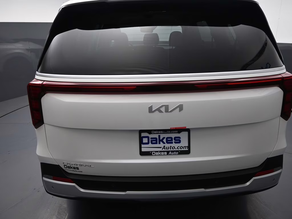 2026 Snow White Pearl Kia Carnival EX FWD Van