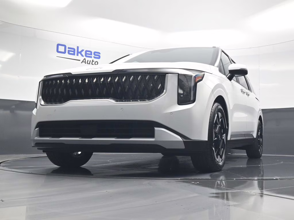 2026 Snow White Pearl Kia Carnival EX FWD Van