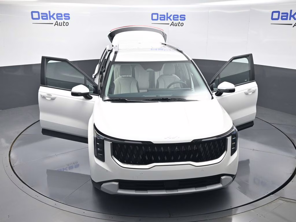 2026 Snow White Pearl Kia Carnival EX FWD Van