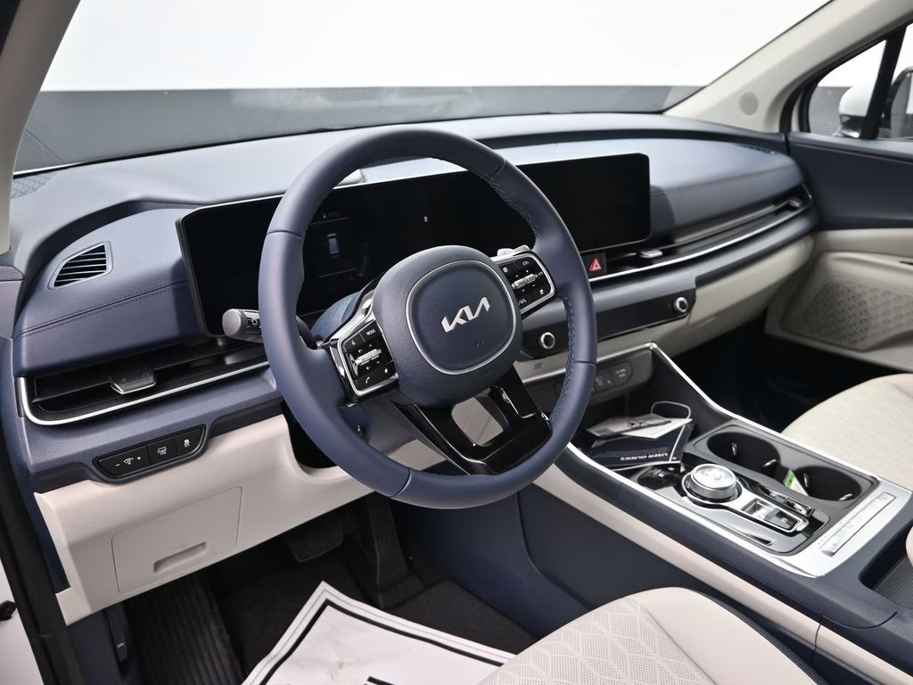 2026 Snow White Pearl Kia Carnival Hybrid EX FWD Van