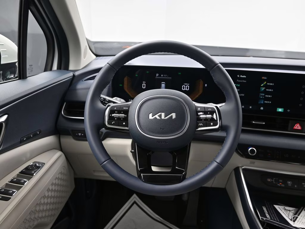 2026 Snow White Pearl Kia Carnival Hybrid EX FWD Van