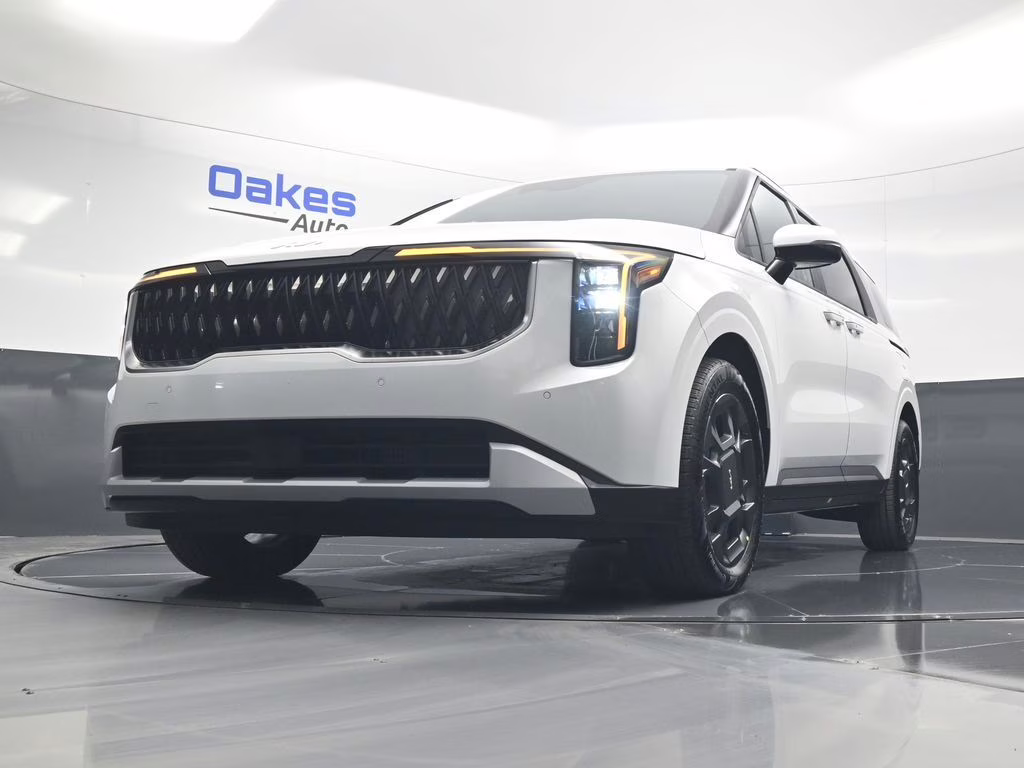 2026 Snow White Pearl Kia Carnival Hybrid EX FWD Van