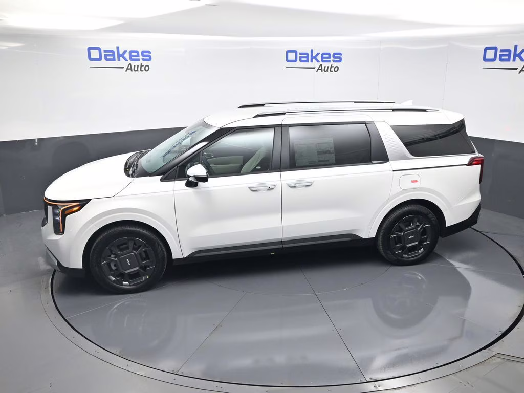 2026 Snow White Pearl Kia Carnival Hybrid EX FWD Van