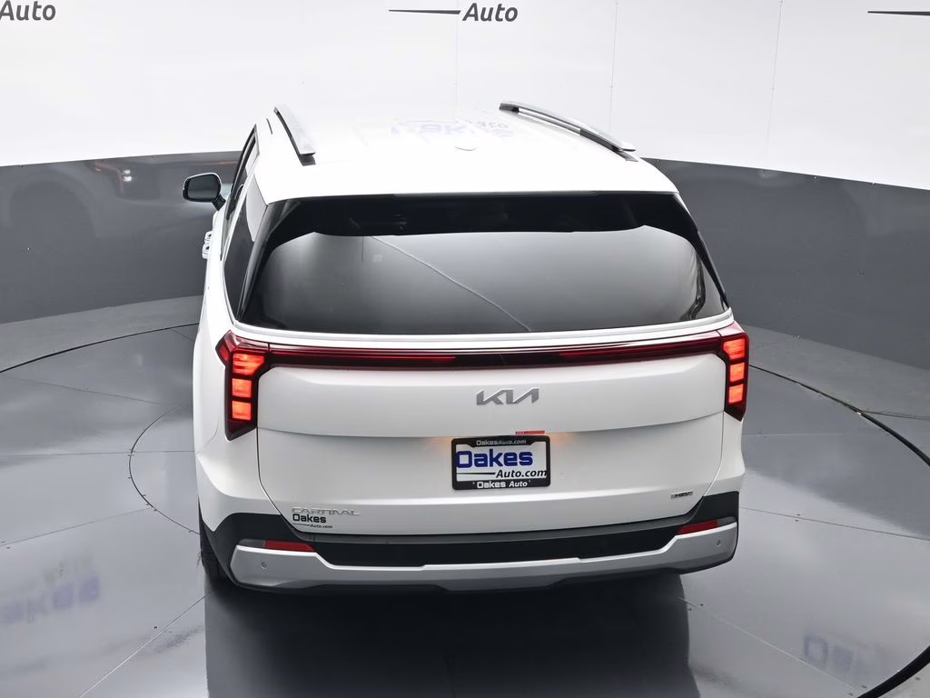 2026 Snow White Pearl Kia Carnival Hybrid EX FWD Van