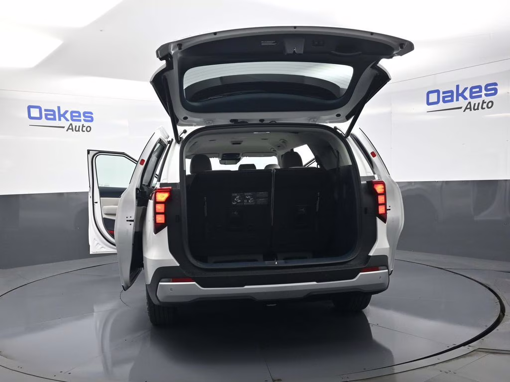 2026 Snow White Pearl Kia Carnival Hybrid EX FWD Van