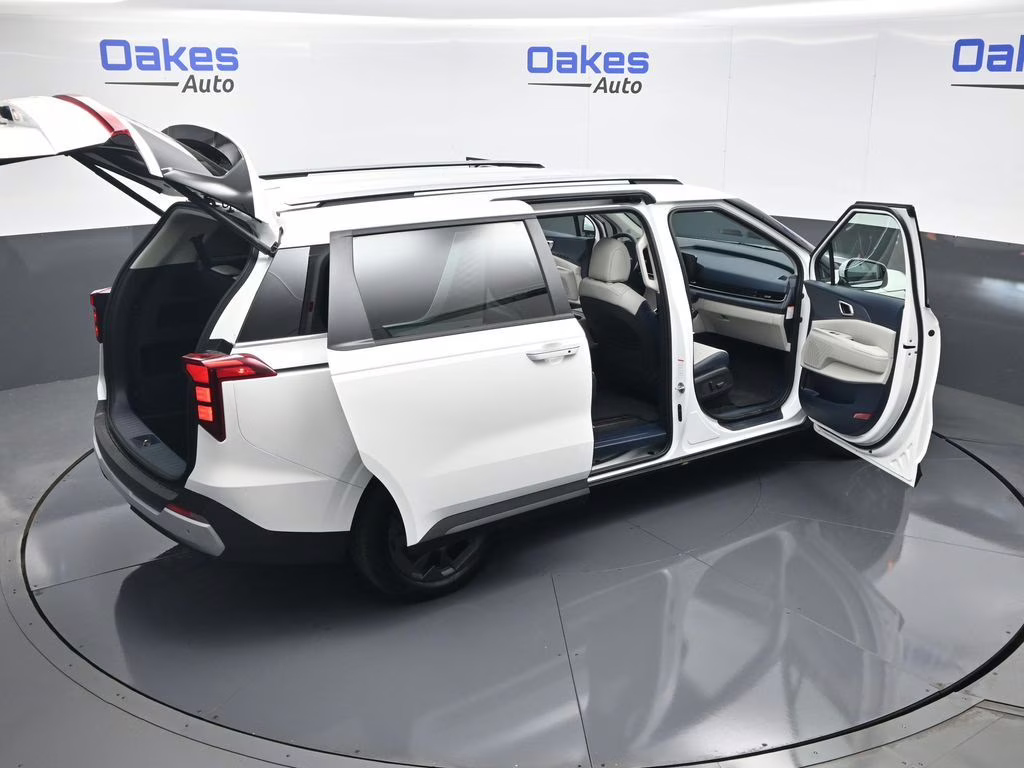 2026 Snow White Pearl Kia Carnival Hybrid EX FWD Van