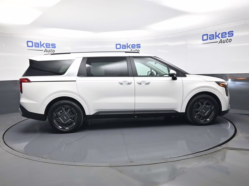 2026 Snow White Pearl Kia Carnival Hybrid EX FWD Van