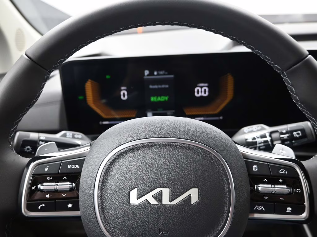 2026 Flare Red Kia Carnival Hybrid EX FWD Van