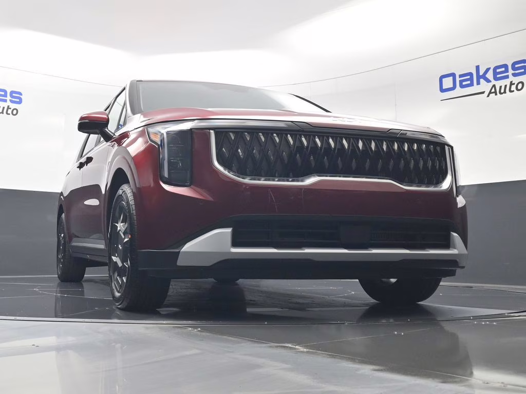 2026 Flare Red Kia Carnival Hybrid EX FWD Van