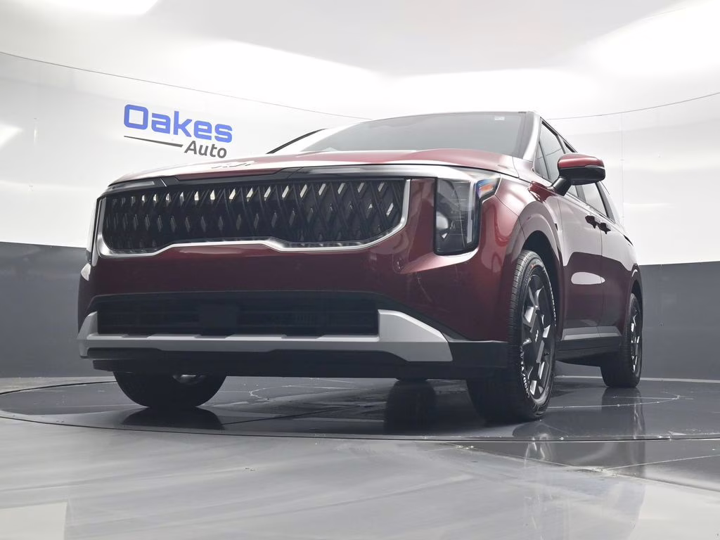 2026 Flare Red Kia Carnival Hybrid EX FWD Van