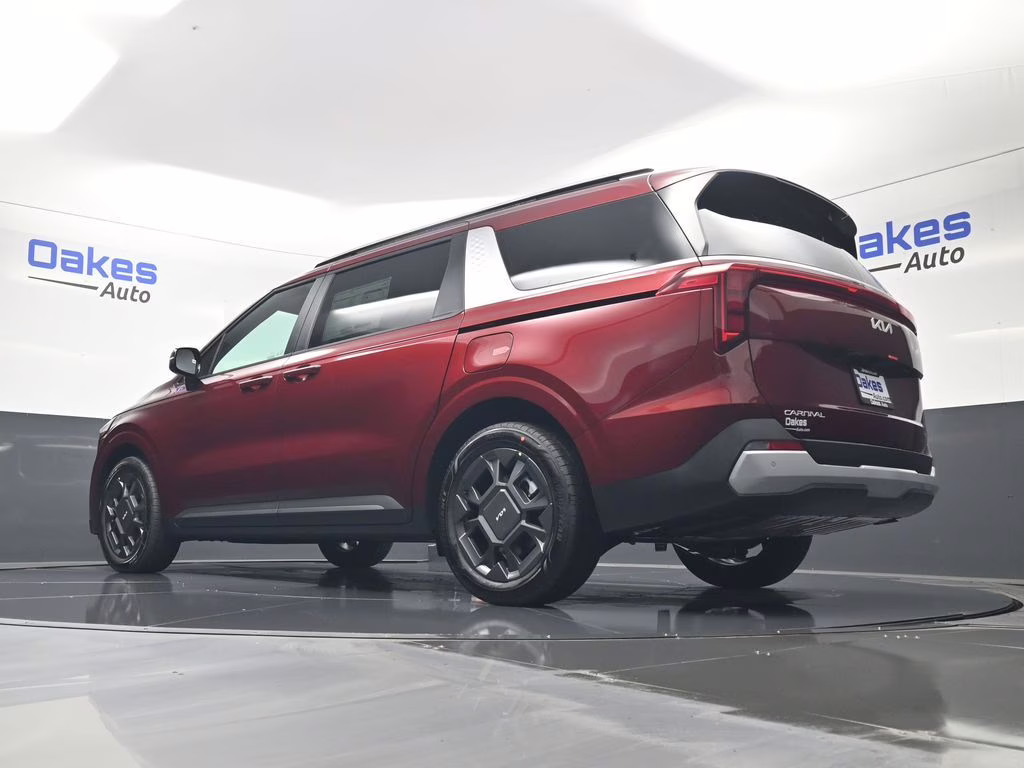 2026 Flare Red Kia Carnival Hybrid EX FWD Van