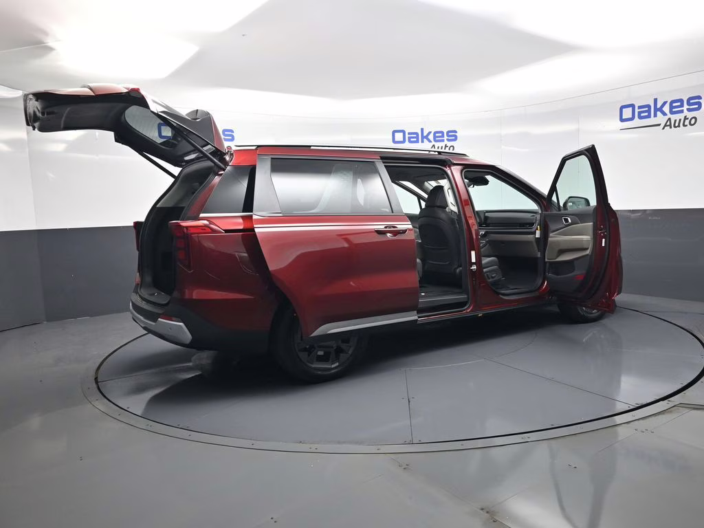 2026 Flare Red Kia Carnival Hybrid EX FWD Van