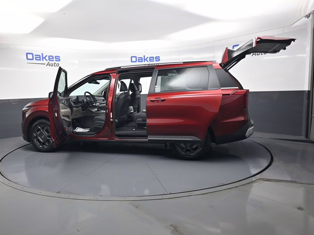 2026 Flare Red Kia Carnival Hybrid EX FWD Van