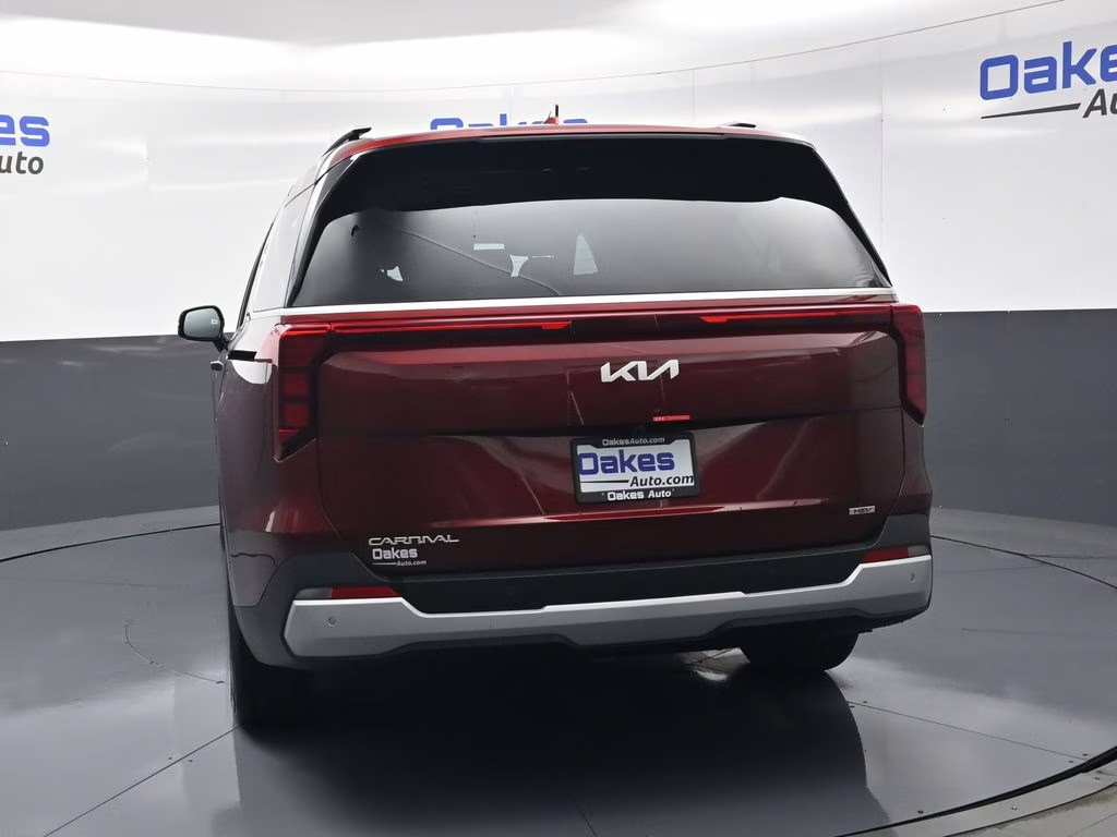 2026 Flare Red Kia Carnival Hybrid EX FWD Van