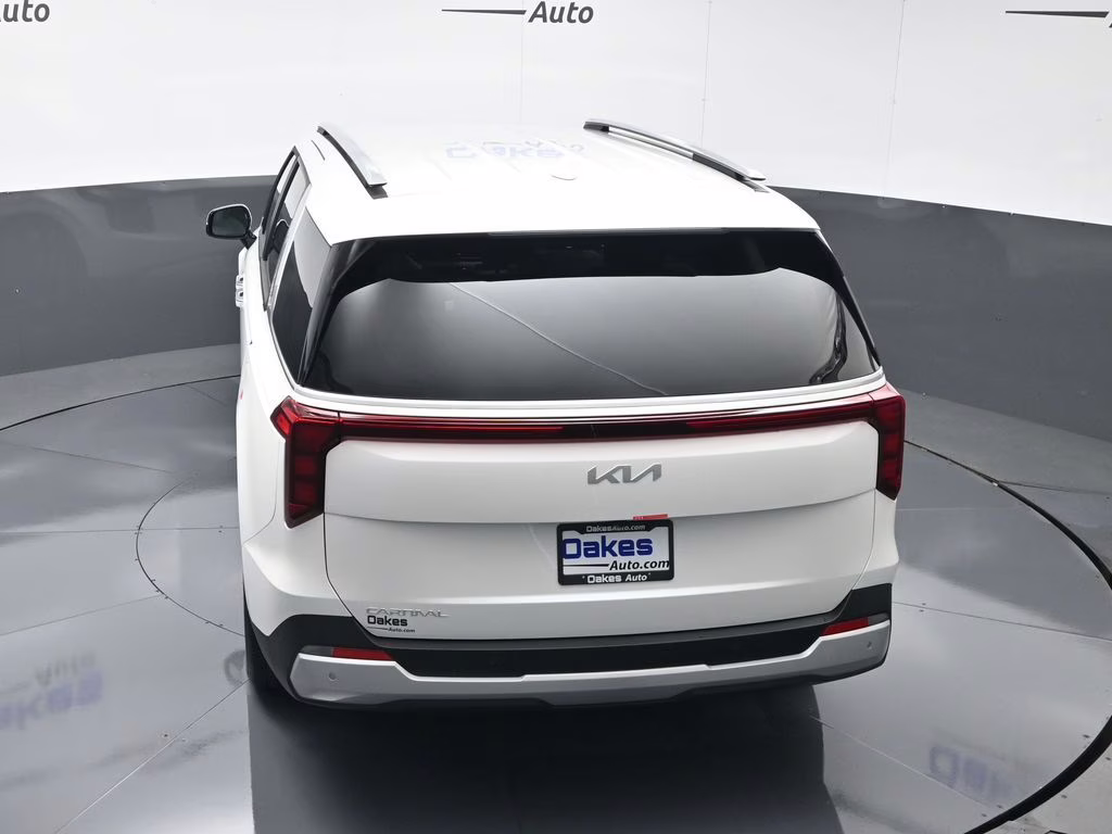 2026 Snow White Pearl Kia Carnival EX FWD Van