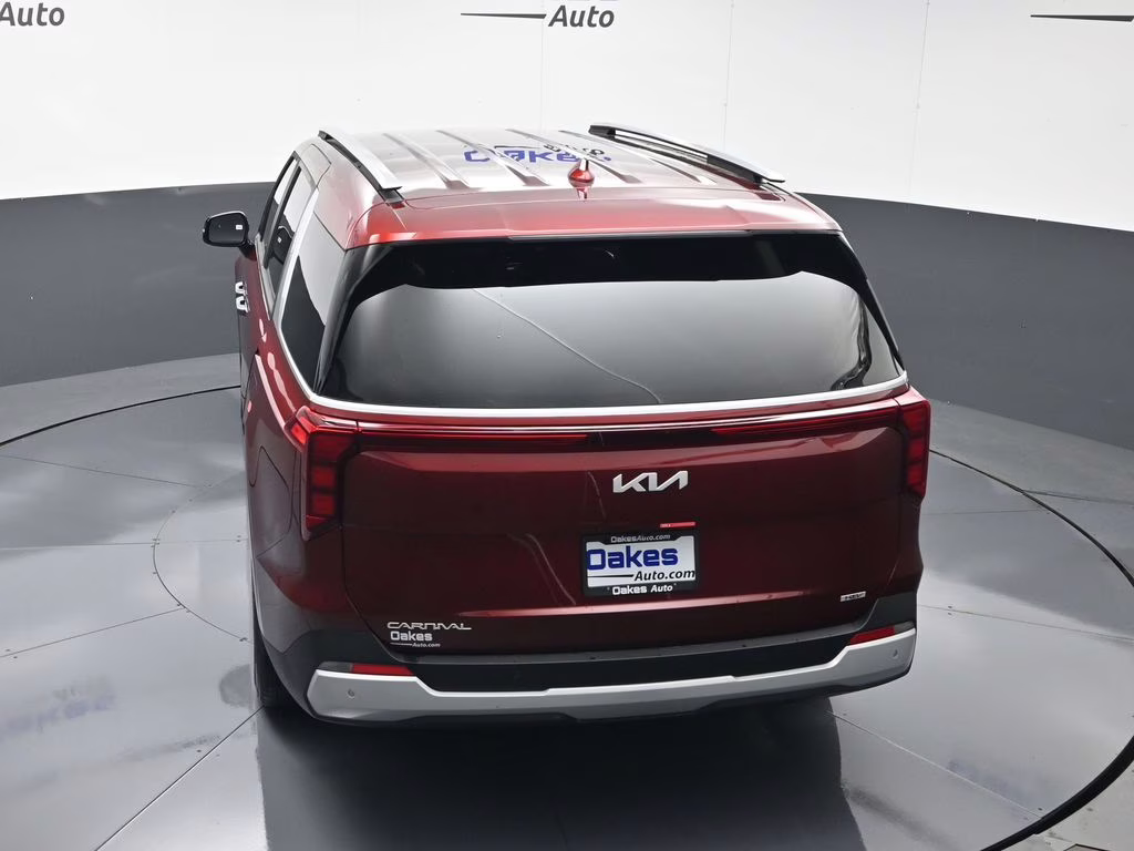2026 Flare Red Kia Carnival Hybrid EX FWD Van