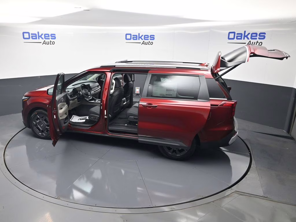 2026 Flare Red Kia Carnival Hybrid EX FWD Van