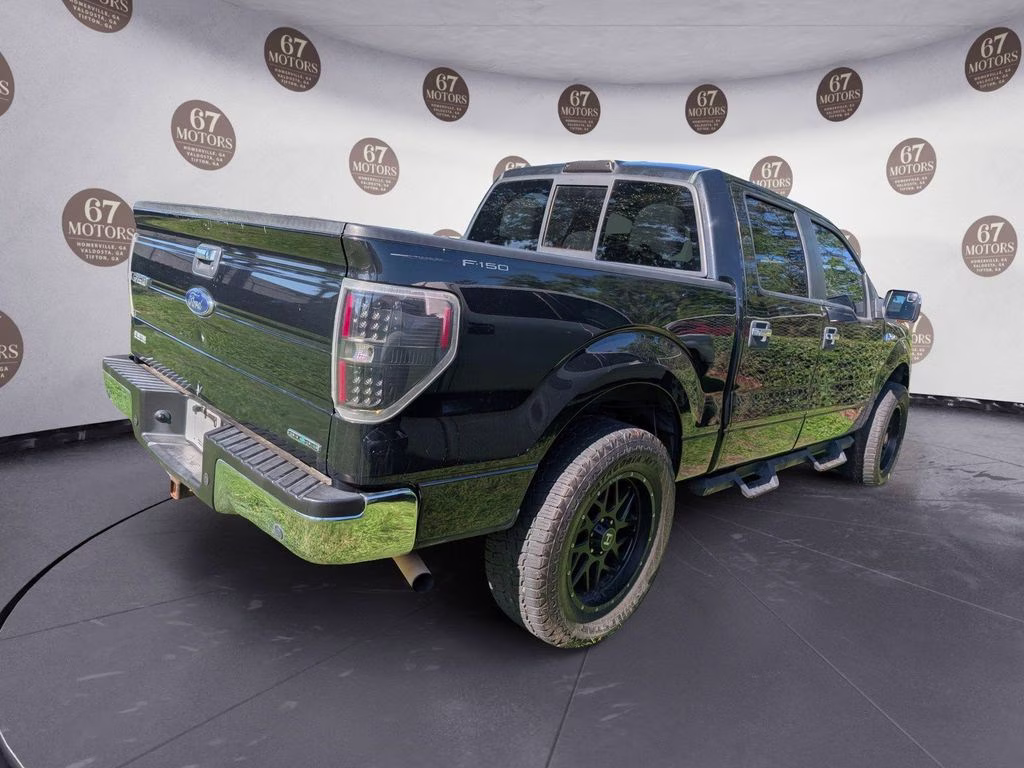 2014 Tuxedo Black Metallic Ford F-150 XLT RWD Truck