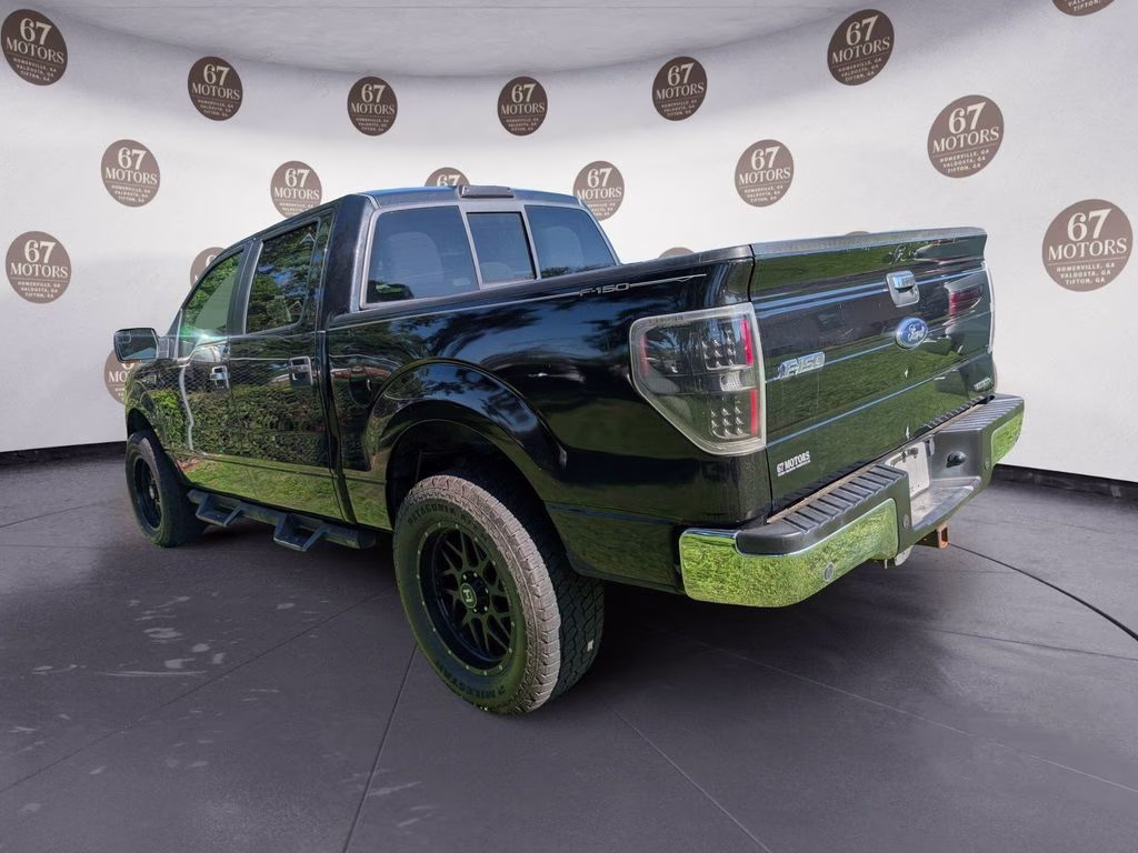 2014 Tuxedo Black Metallic Ford F-150 XLT RWD Truck