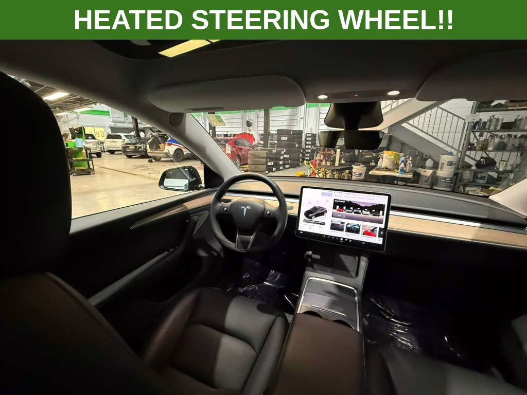 2024 Solid Black Tesla Model Y Long Range AWD SUV