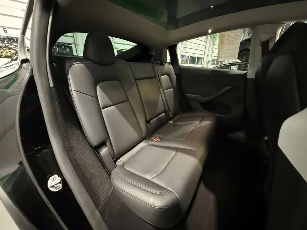 2024 Solid Black Tesla Model Y Long Range AWD SUV