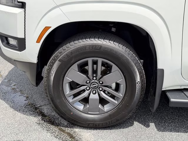 2025 Glacier White Nissan Frontier SV RWD Truck