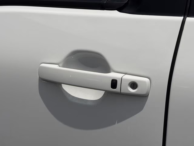 2025 Glacier White Nissan Frontier SV RWD Truck